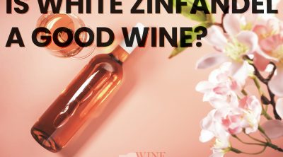 glass and bottle of rose with text is white zinfandel a good wine